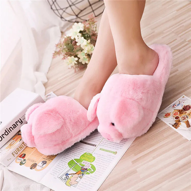 Pink pig floor slippers with short plush fabric and PP cotton filling.