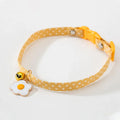 Small pet collar with bell pendant and decorative bow tie in adjustable design