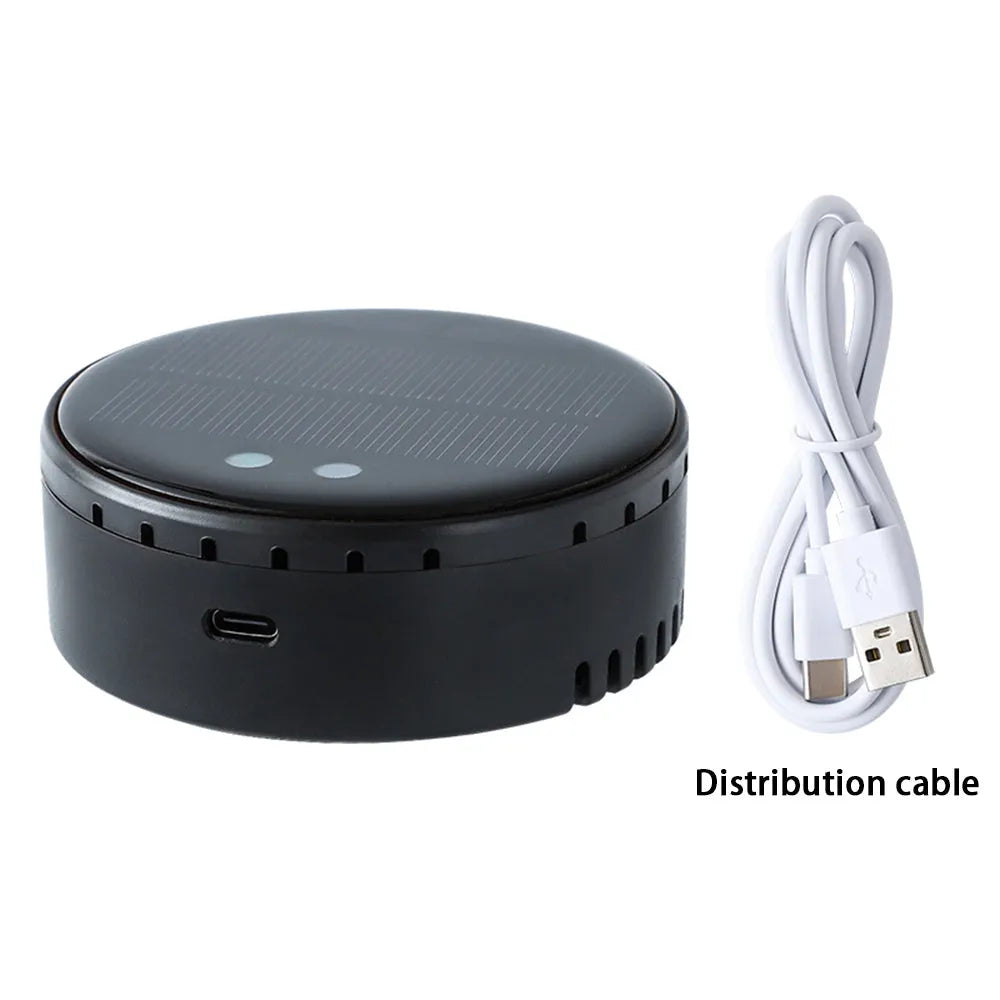 Car-mounted solar air humidifier in black colour installed on dashboard vent