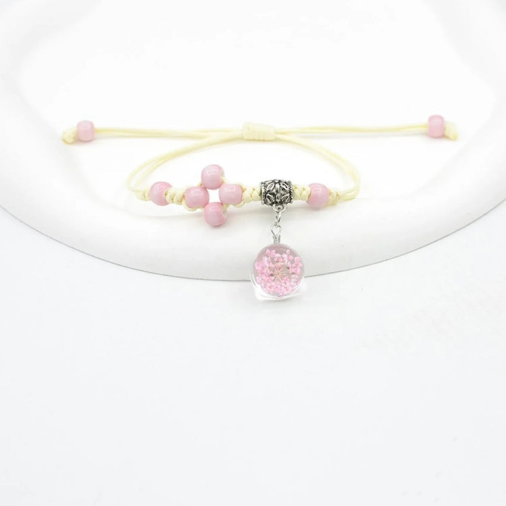 Glass dried flower bracelet with real preserved flowers and colourful 1.4cm beads in hand-woven design