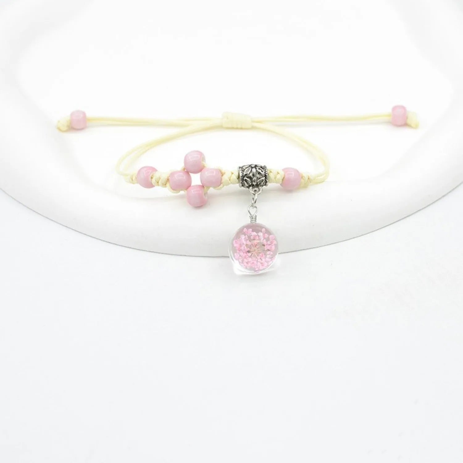 Glass dried flower bracelet with real preserved flowers and colourful 1.4cm beads in hand-woven design