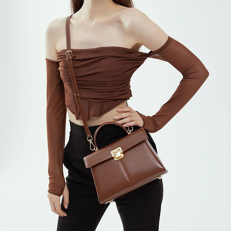 Women's genuine leather shoulder bag in horizontal square design with cover opening