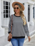 Black plaid striped long sleeve pullover sweater with printed design elements
