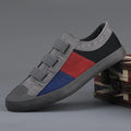 Men's low-top canvas sneakers with elastic band closure in beige colour