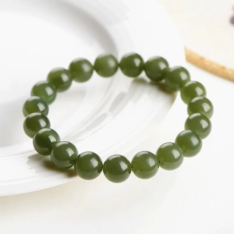 Polished Hetian jade bead bracelet showing deep water clear and light water clear colour options.