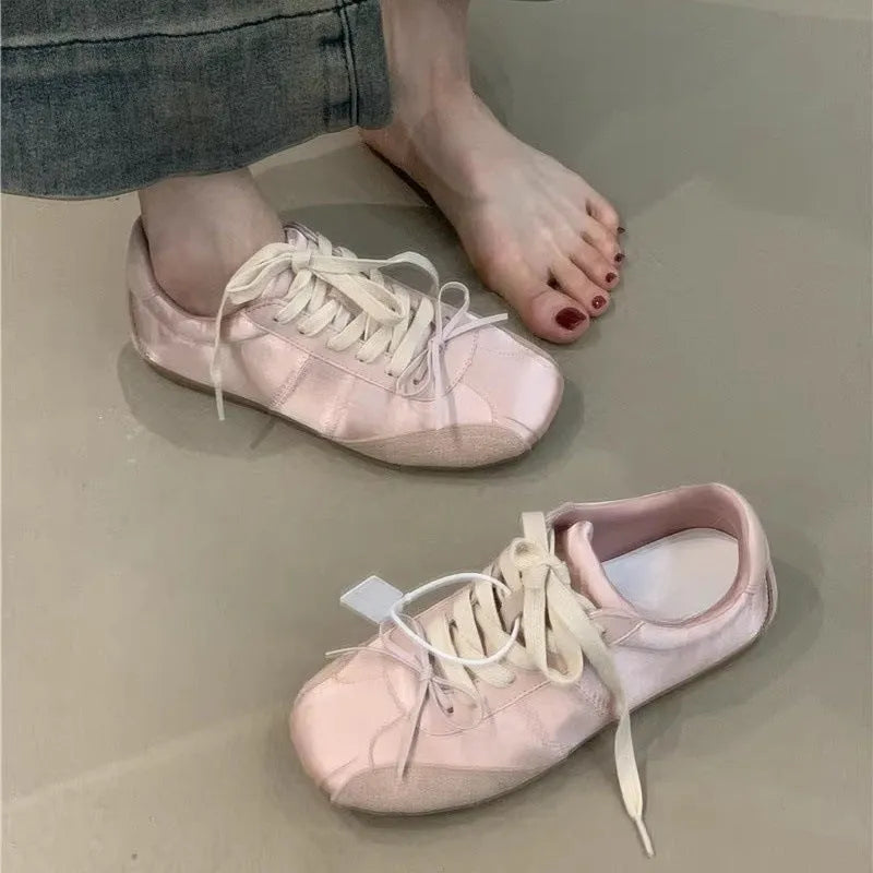 Girlish style bow white sneaker for women, low-top round toe, black colour option, side view