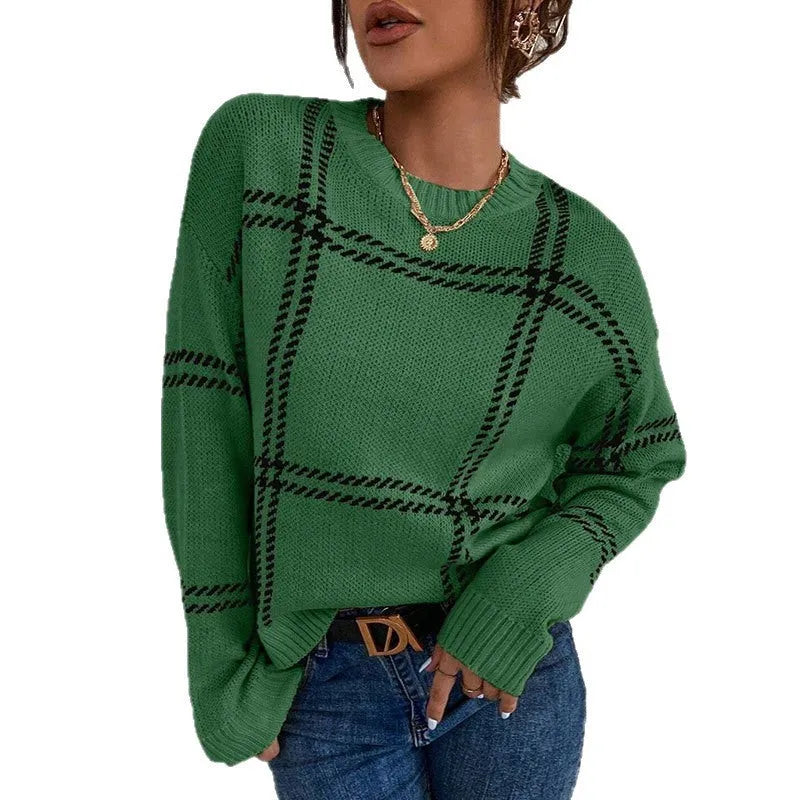 Women's loose fit plaid sweater with colour-block stripes in apricot, black, beige, red, and green.