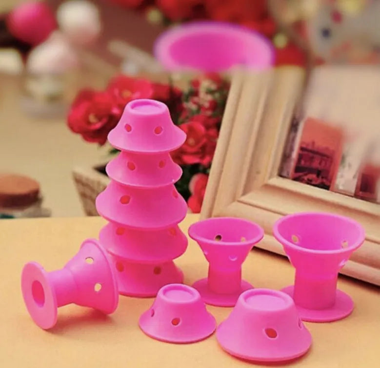 Set of ten soft silicone hair rollers in pink, blue, purple, and black, large 5cm and small 3.9cm diameter