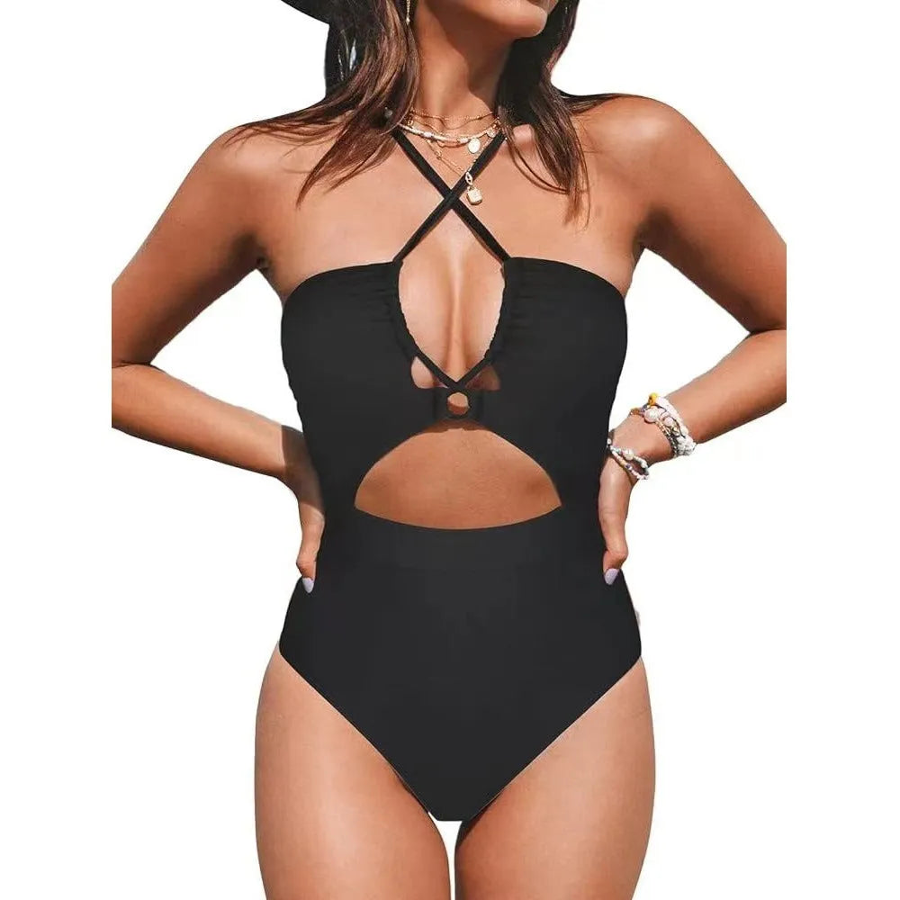 Women's solid colour backless one-piece swimsuit in black, red, or blue.