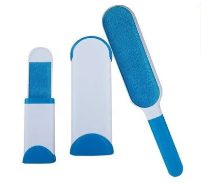 Blue reusable pet hair removal comb with double-sided brush next to its self-cleaning base.