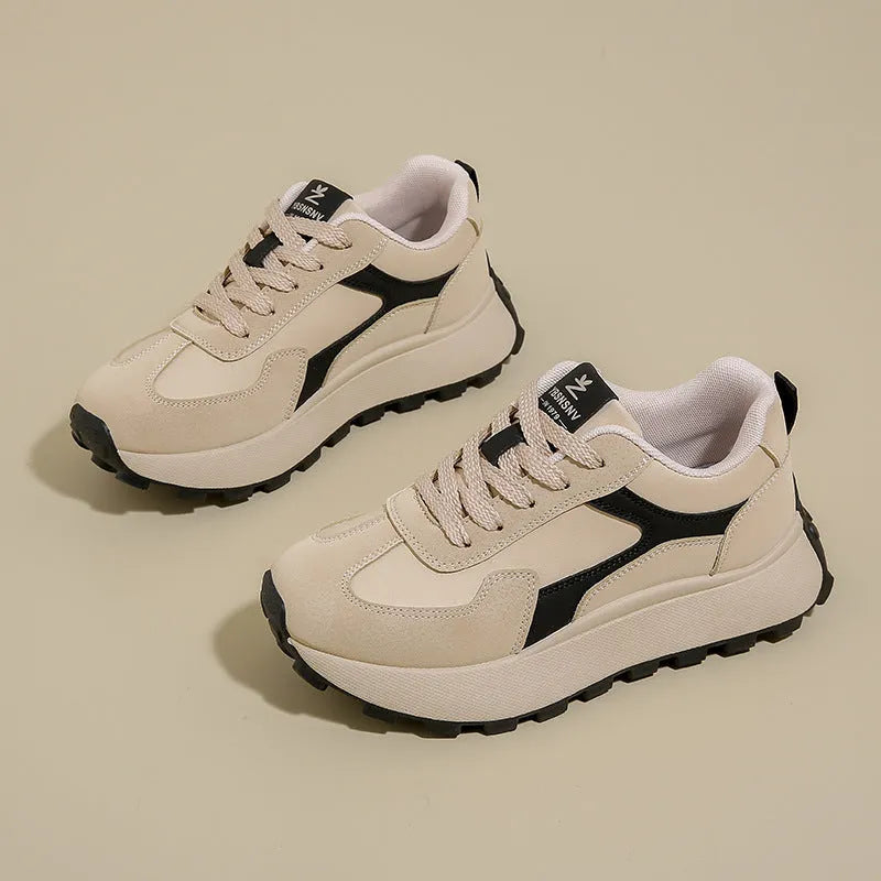 Women's low-top platform sports shoes in card black colour with lace-up front and rubber sole