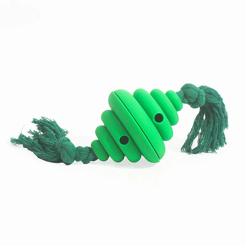 Green and yellow split oval dog ball with attached rope, a treat-dispensing chew toy