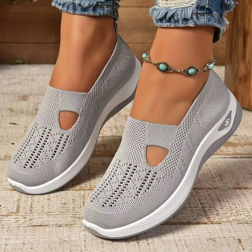Casual mesh T-strap flat shoe for women in a selection of colours on a soft PVC sole.