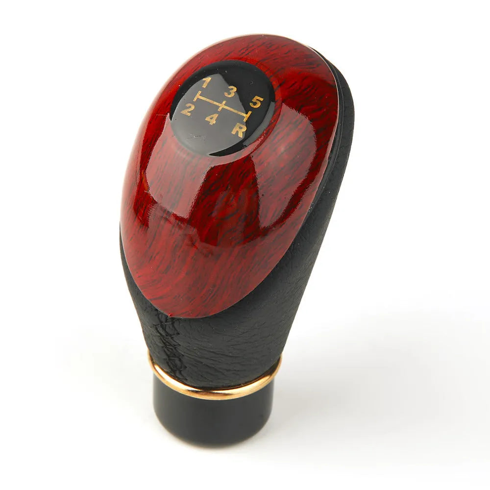 PU leather manual gearshift cover in black with imitation mahogany detailing on a round gearstick