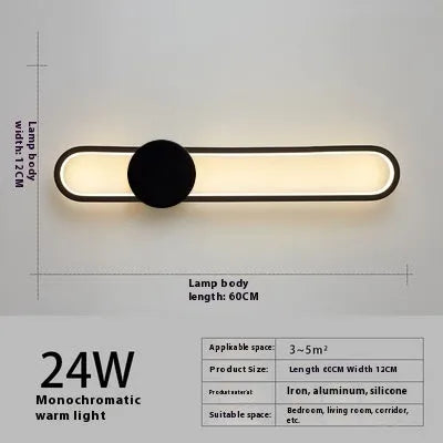 Modern round wall lamp with iron shade in choice of four finishes including black and gold options