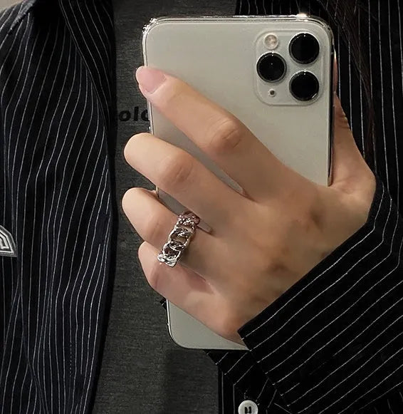 Golden aluminium alloy adjustable geometric ring chain on white background