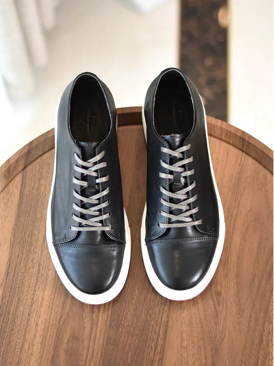 Men's handmade first-grain horse leather distressed casual shoes in dark brown with lace-up closure and stitching