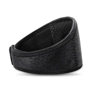 Black adjustable magnetic therapy neck guard with self-heating tourmaline on a flat surface.