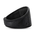 Black adjustable magnetic therapy neck guard with self-heating tourmaline on a flat surface.