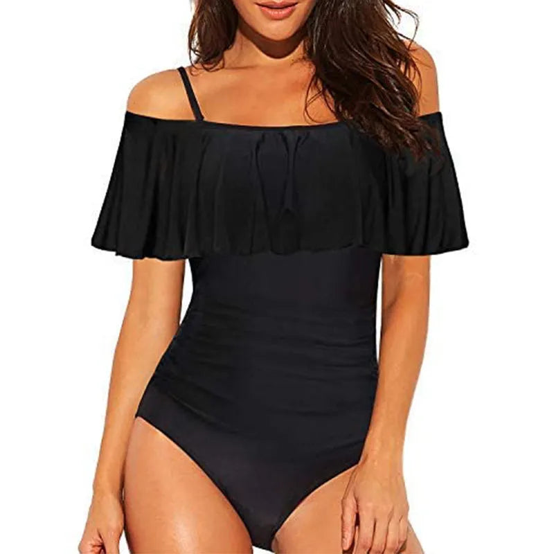Black one-piece swimsuit with ruffled straps and side cut-out detailing.