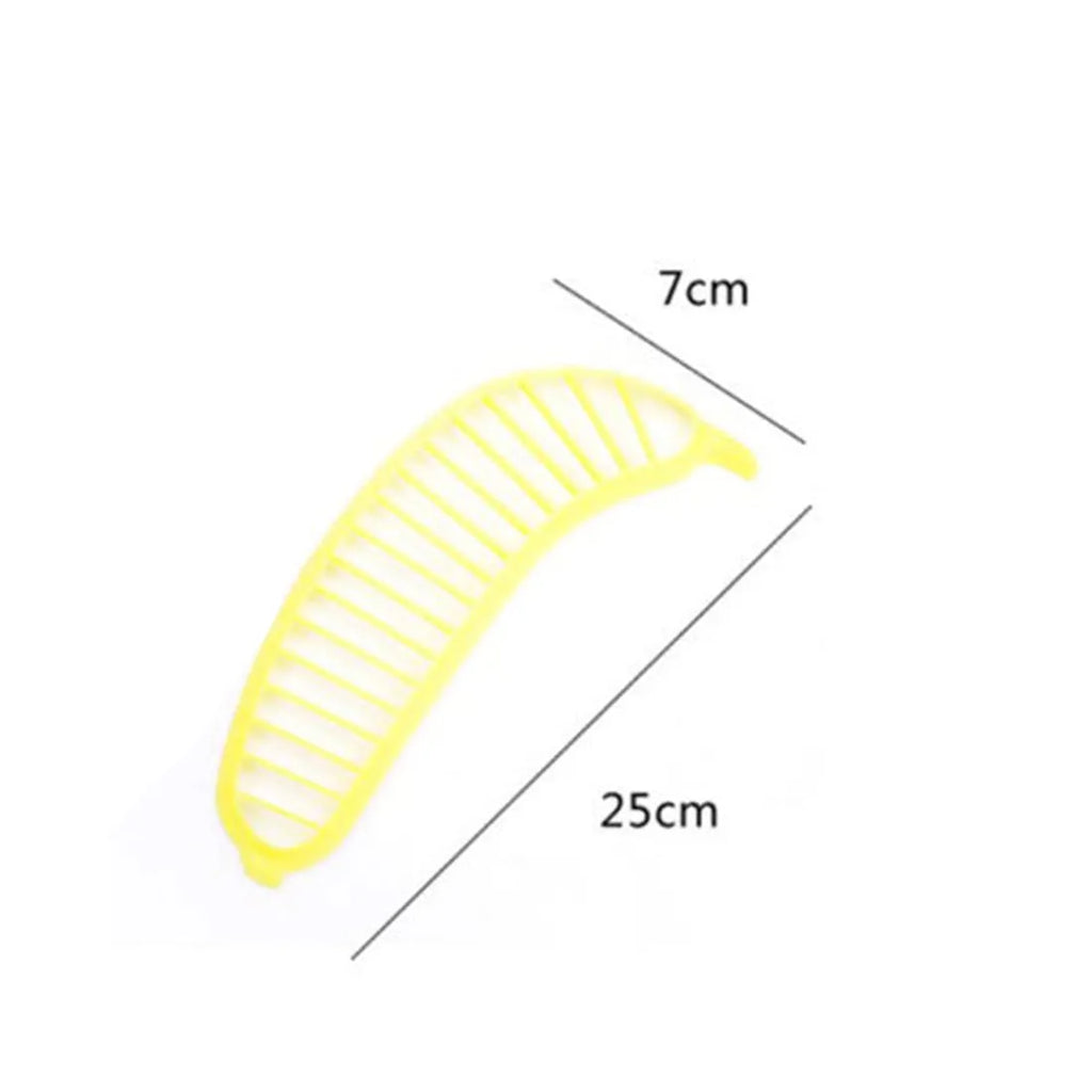 Yellow banana cutter slicer made from food-grade PP plastic, 25 x 7 x 1.4 cm, on a light background