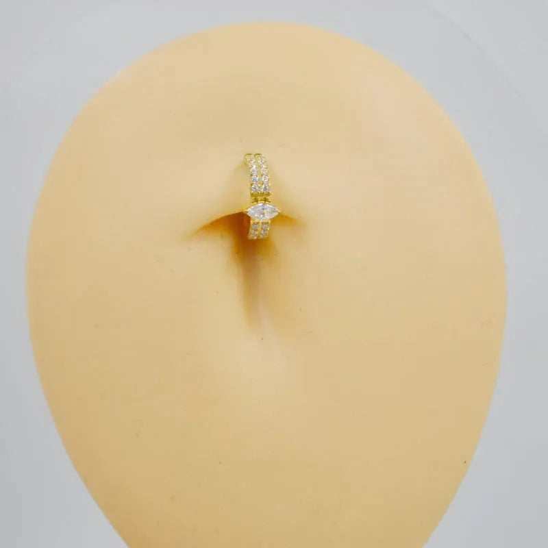 Close-up of a heart-shaped zircon diamond look earring in titanium steel, showing silver or gold colour on a 1.2x8mm setting.