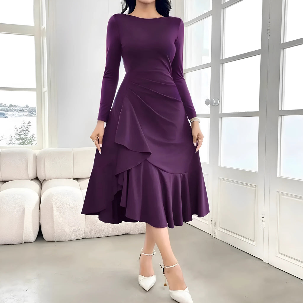 Purple women's long sleeve dress with ruffles and a round neck.