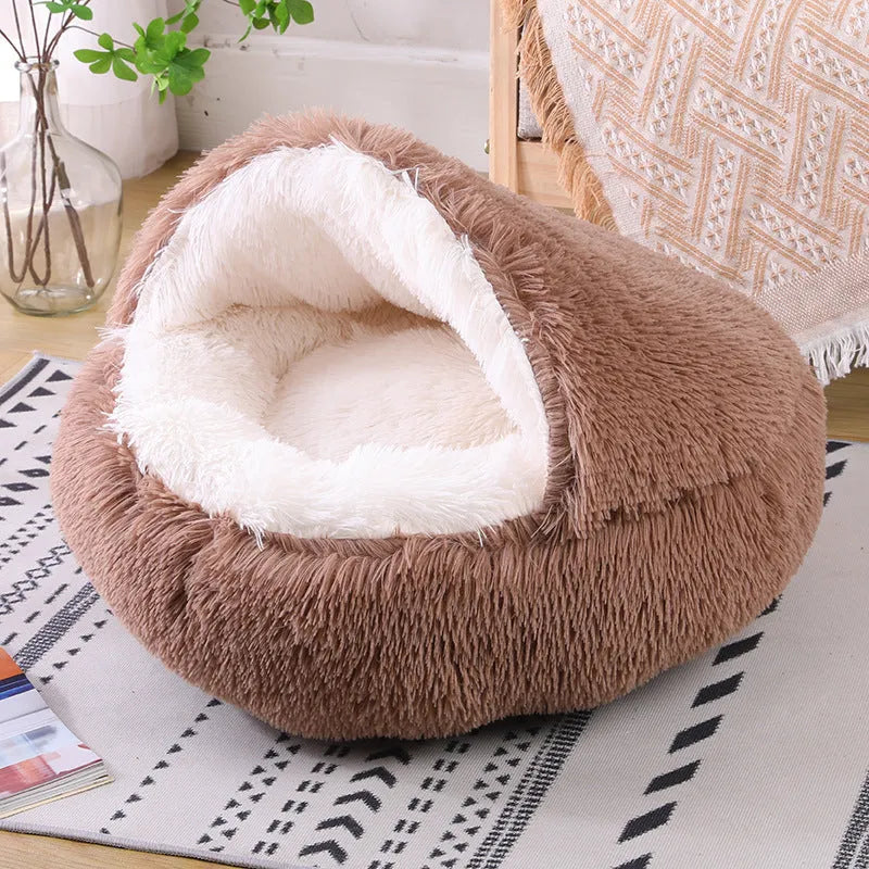 Semi-surrounded soft cloth dog kennel in champagne colour with a removable cushion inside.