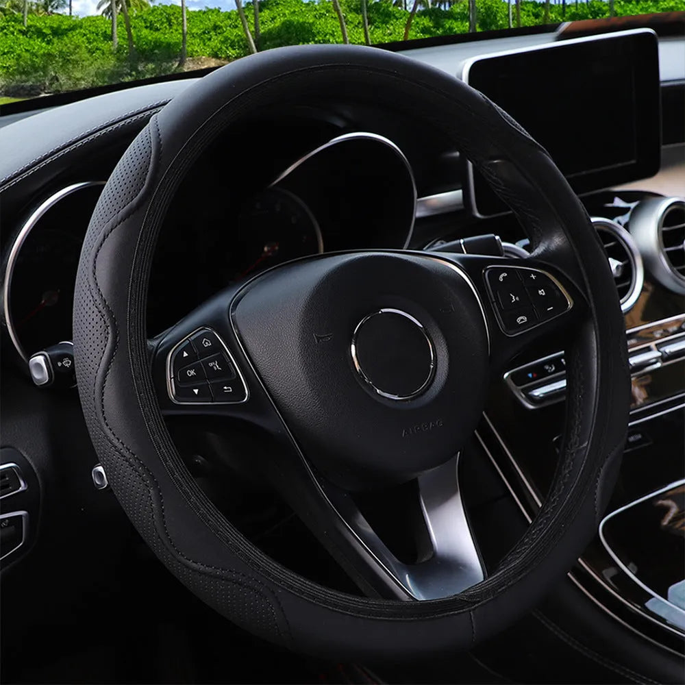 Black elastic PU leather steering wheel cover with an embossed corrugated pattern, shown fitted on a car steering wheel.