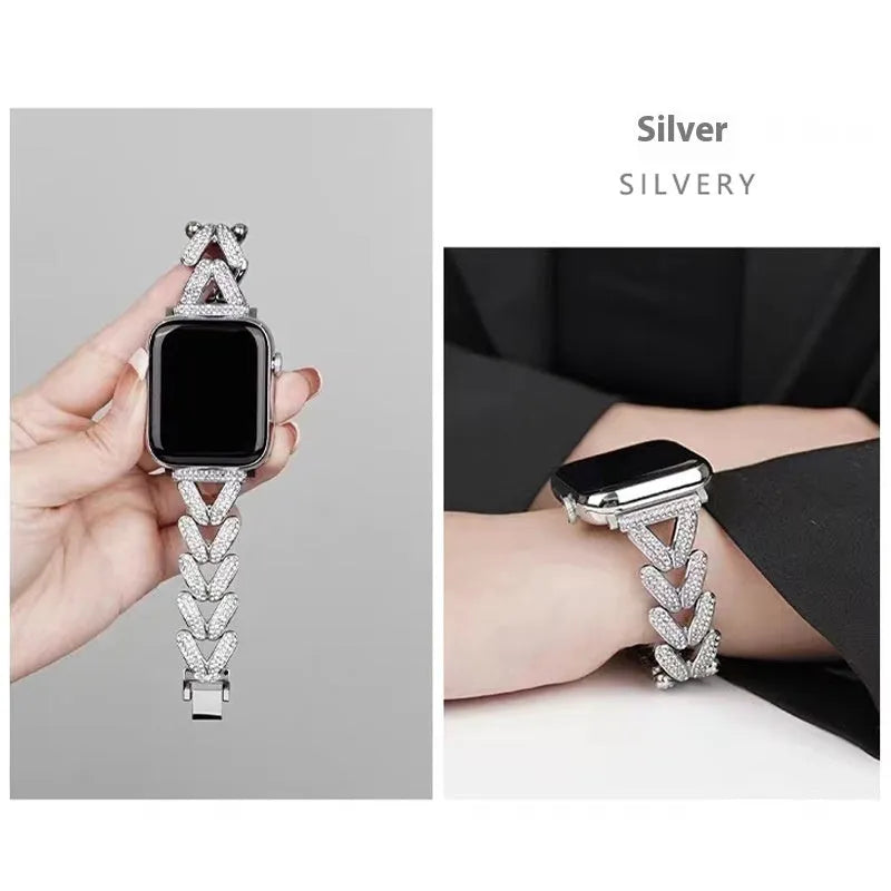 Silver metal Apple Watch strap with V-shaped diamond-embedded detailing