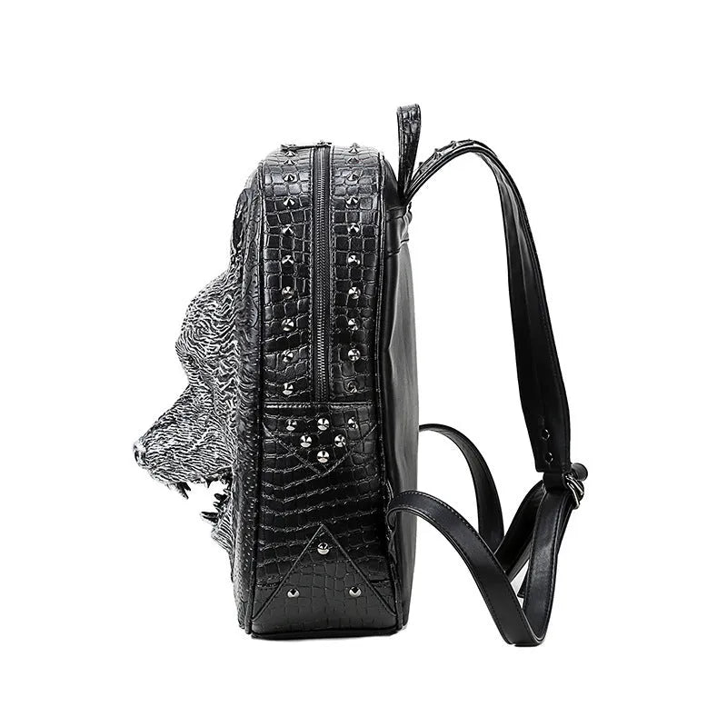3D wolf head PU leather backpack in black with rivet details, large capacity, side view