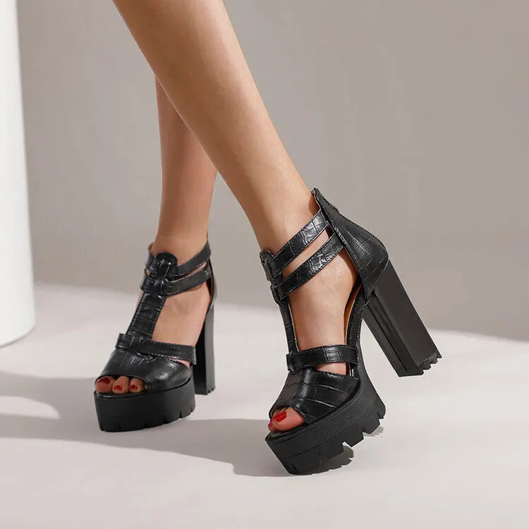 Women's platform high heel sandal in black with a round toe and a back zipper closure.