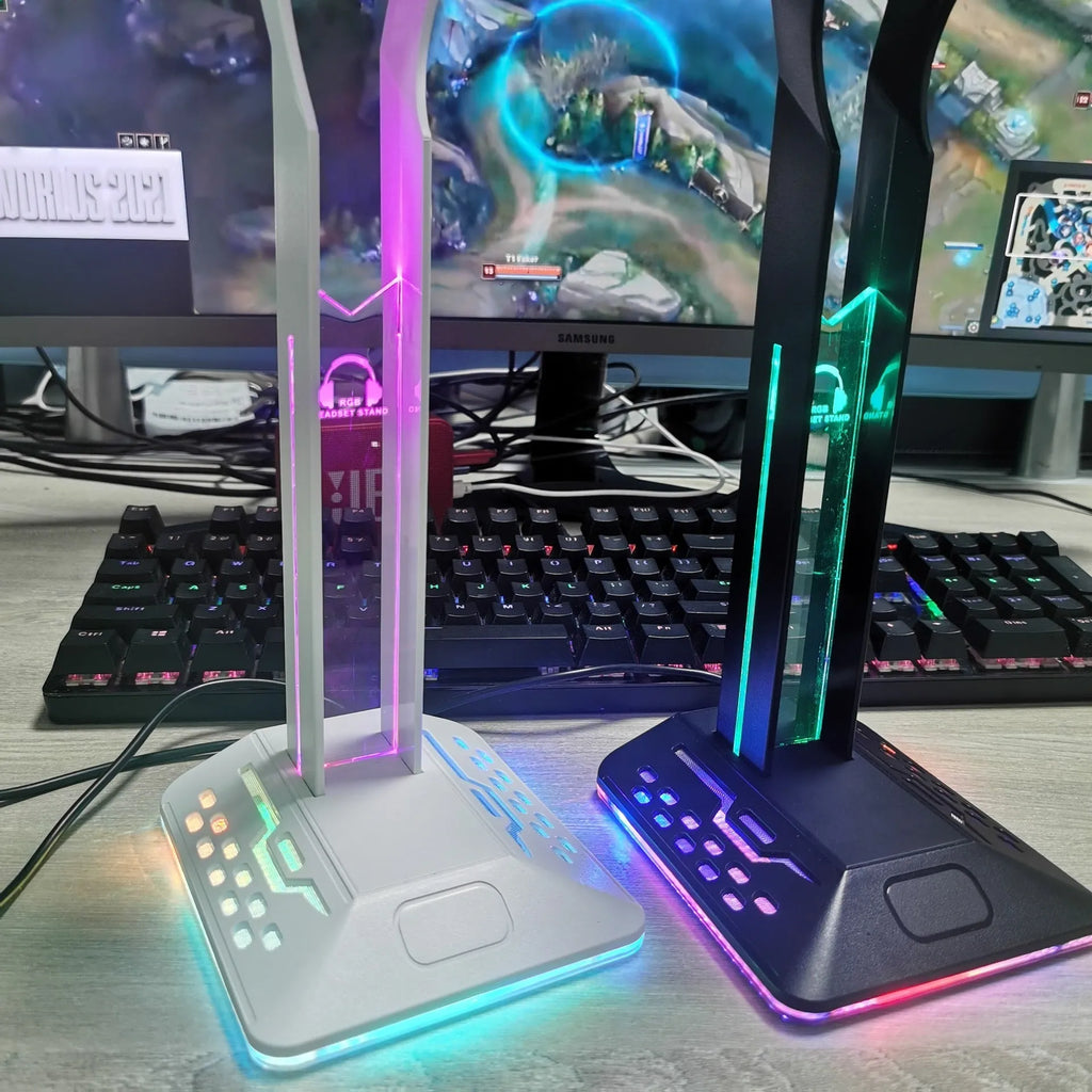 RGB headphone stand with glowing colour-changing lights and two USB ports, holding a gaming headset.