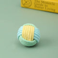 Handmade cat hair ball plush cotton toy in blue powder, green blue, or pink green colours measuring 5cm diameter
