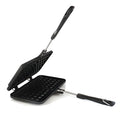 Black non-stick aluminium waffle plaid cake mold with locking handle on gas stove