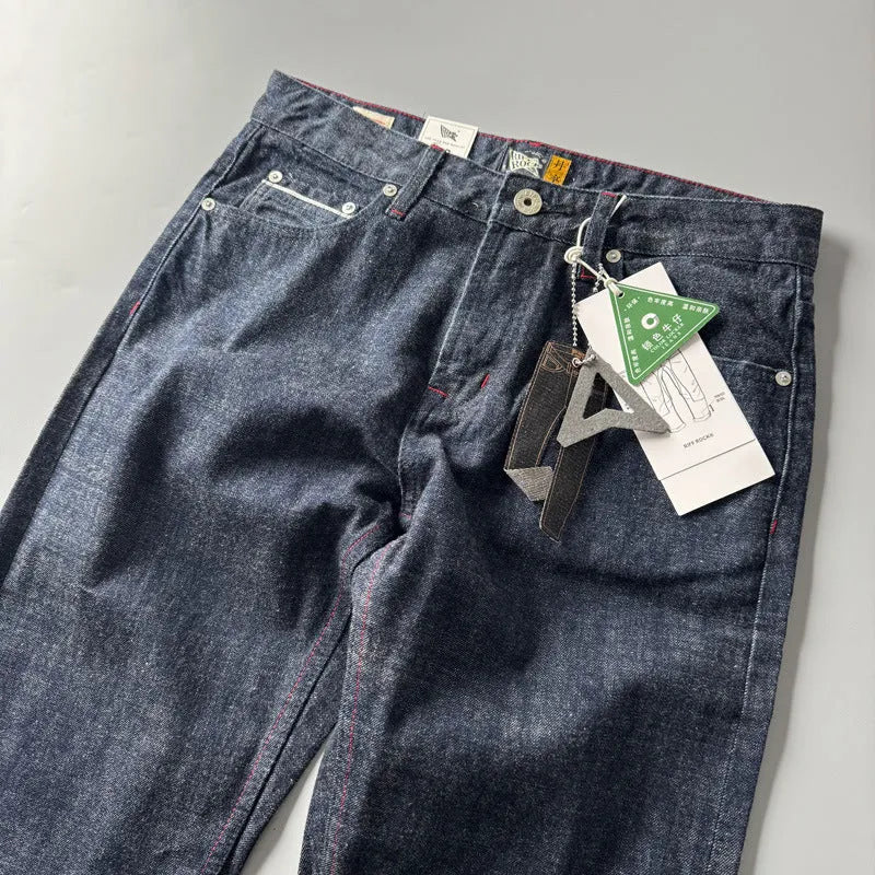 Men's primary colour straight leg jeans in American retro style on a hanger