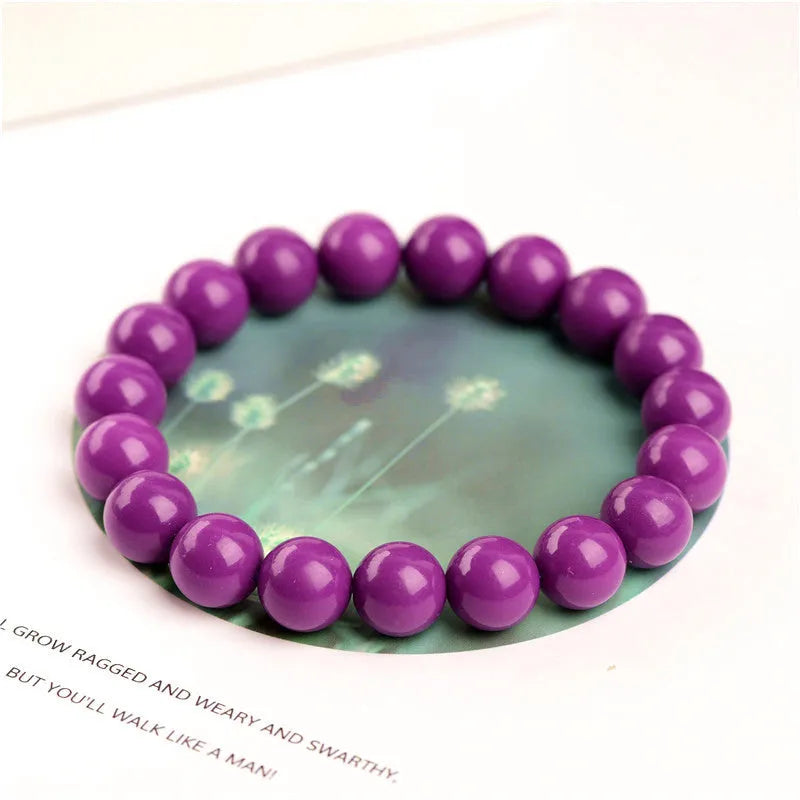 Jiuya purple mica crystal bracelet showing polished stones in 5A colour grade