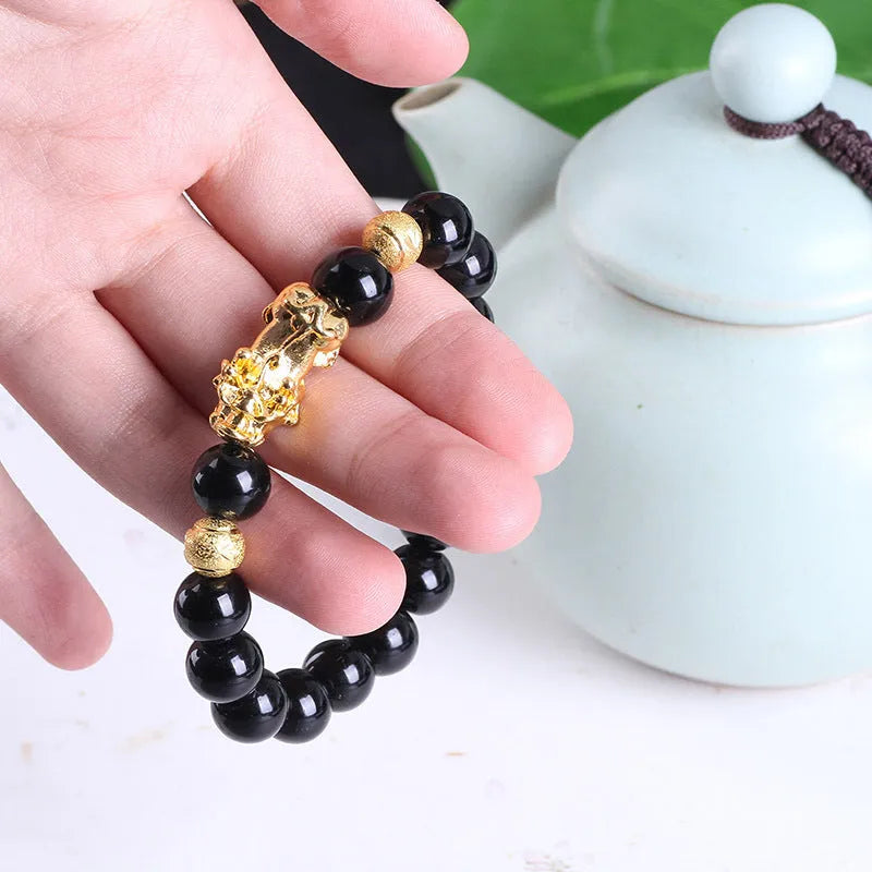 Imitation obsidian 18K gold bracelet with six brave words and little pearl on hand
