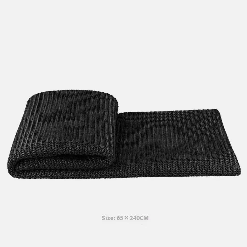 Modern minimalist grey and white plaid bed runner set with pillowcase and round leather pillow on bed