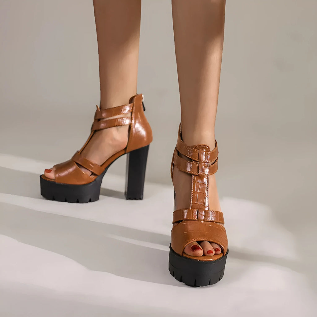 Women's platform high heel sandal in black with a round toe and a back zipper closure.