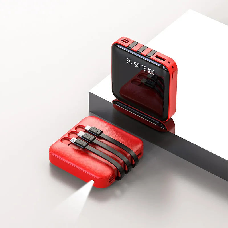 Black power bank with built-in charging cable showing 10000mAh capacity