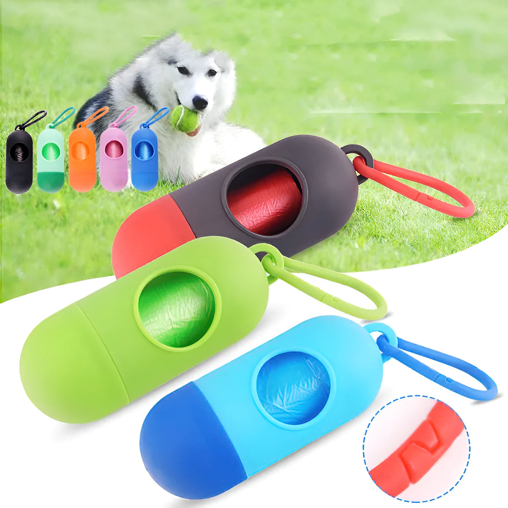 Compact black dog poop bag holder with a metal hook and Velcro strap, showing scale.