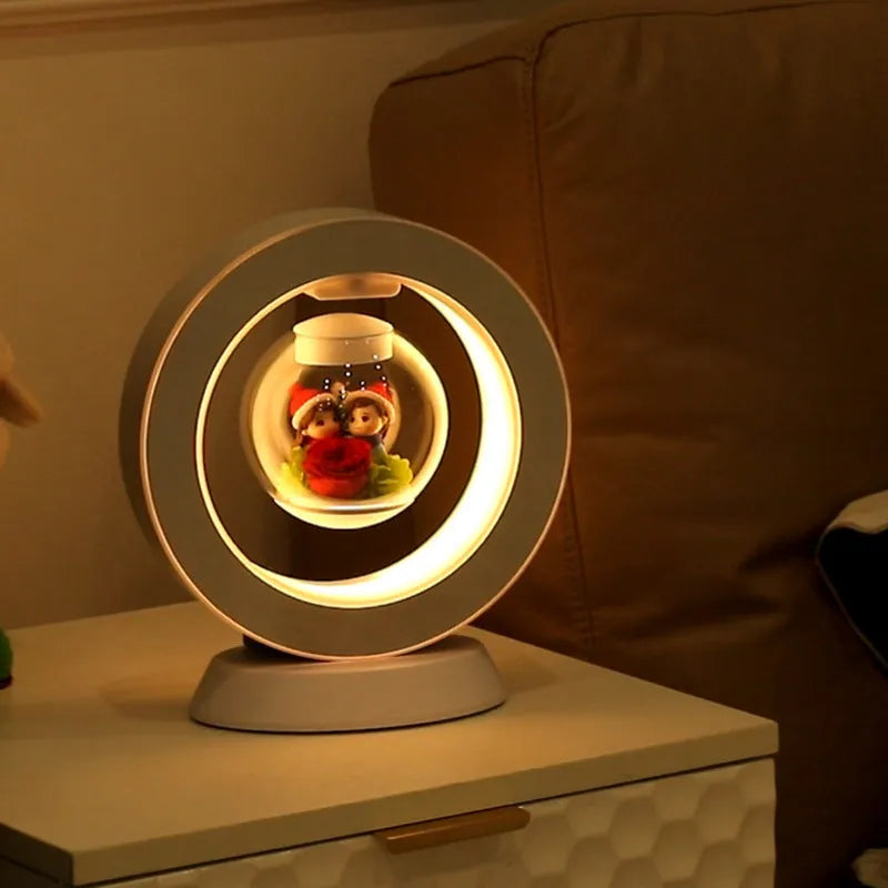Magnetic levitation heart night light with pink eternal rose on a triangular stand