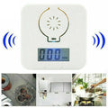 White wireless carbon monoxide alarm mounted on wall for kitchen bathroom safety