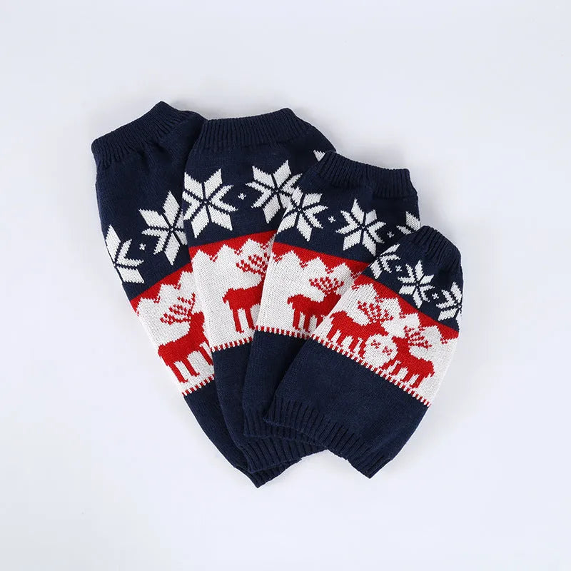 Navy blue knitted Christmas sweater for a dog on a white background.