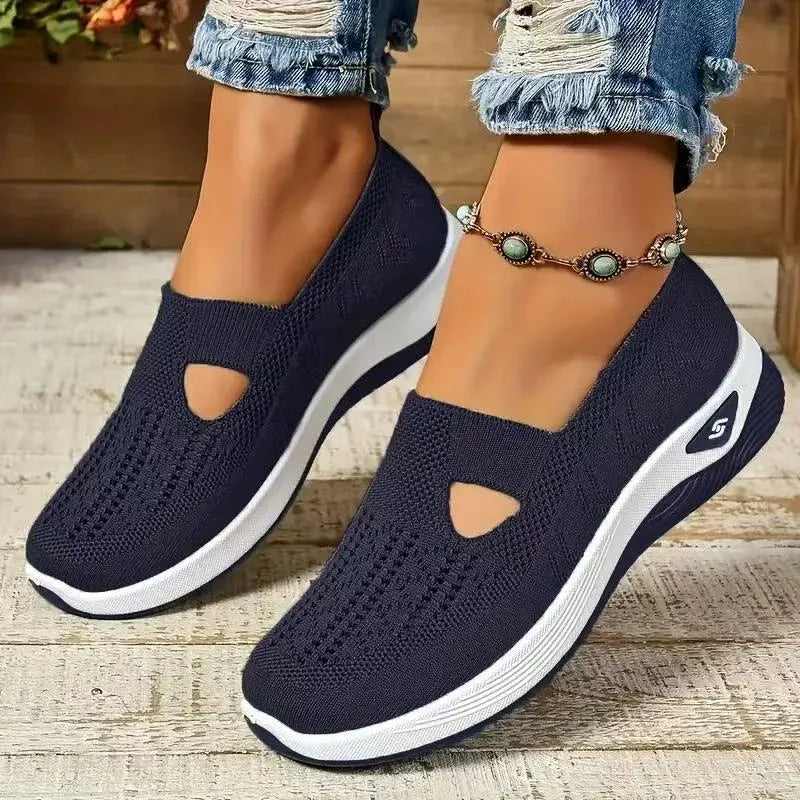 Casual mesh T-strap flat shoe for women in a selection of colours on a soft PVC sole.