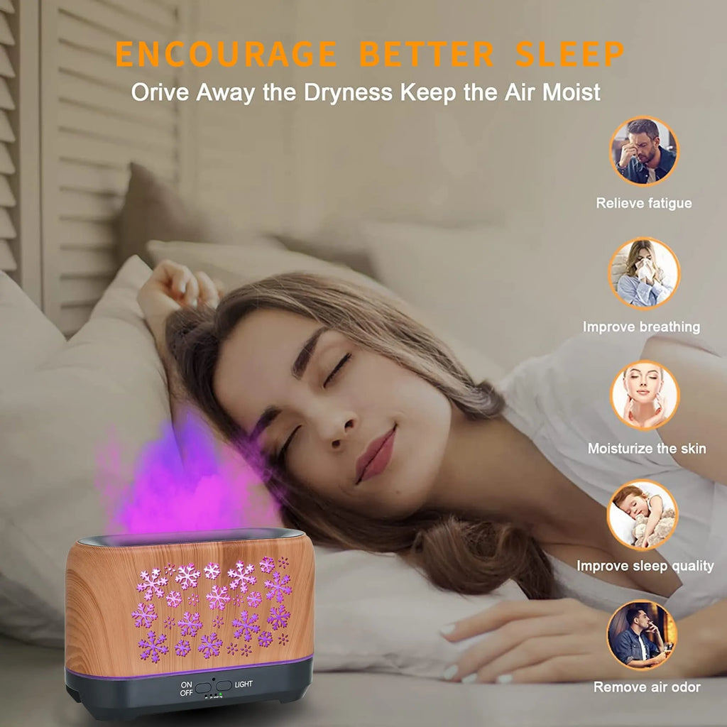 Colourful snowflake wood grain aromatherapy humidifier with glowing flame effect on a desktop.