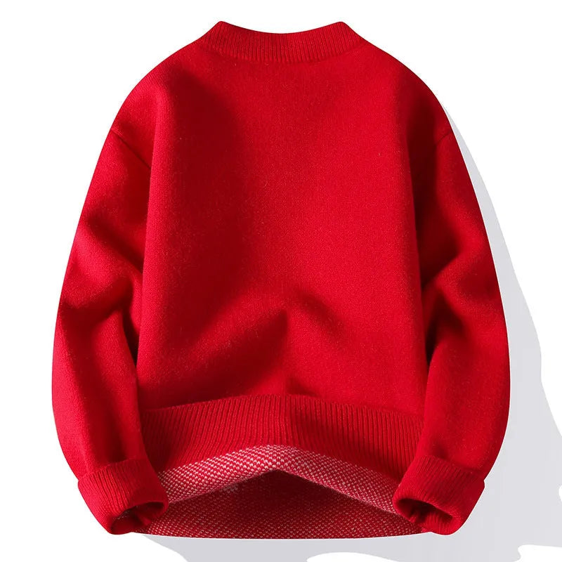 Men's loose fit grey knitted pullover with long sleeves and a ribbed hemline.