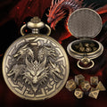 Steampunk pocket watch shaped dice set open revealing 7 polyhedral dice in zinc alloy bronze finish on dark background