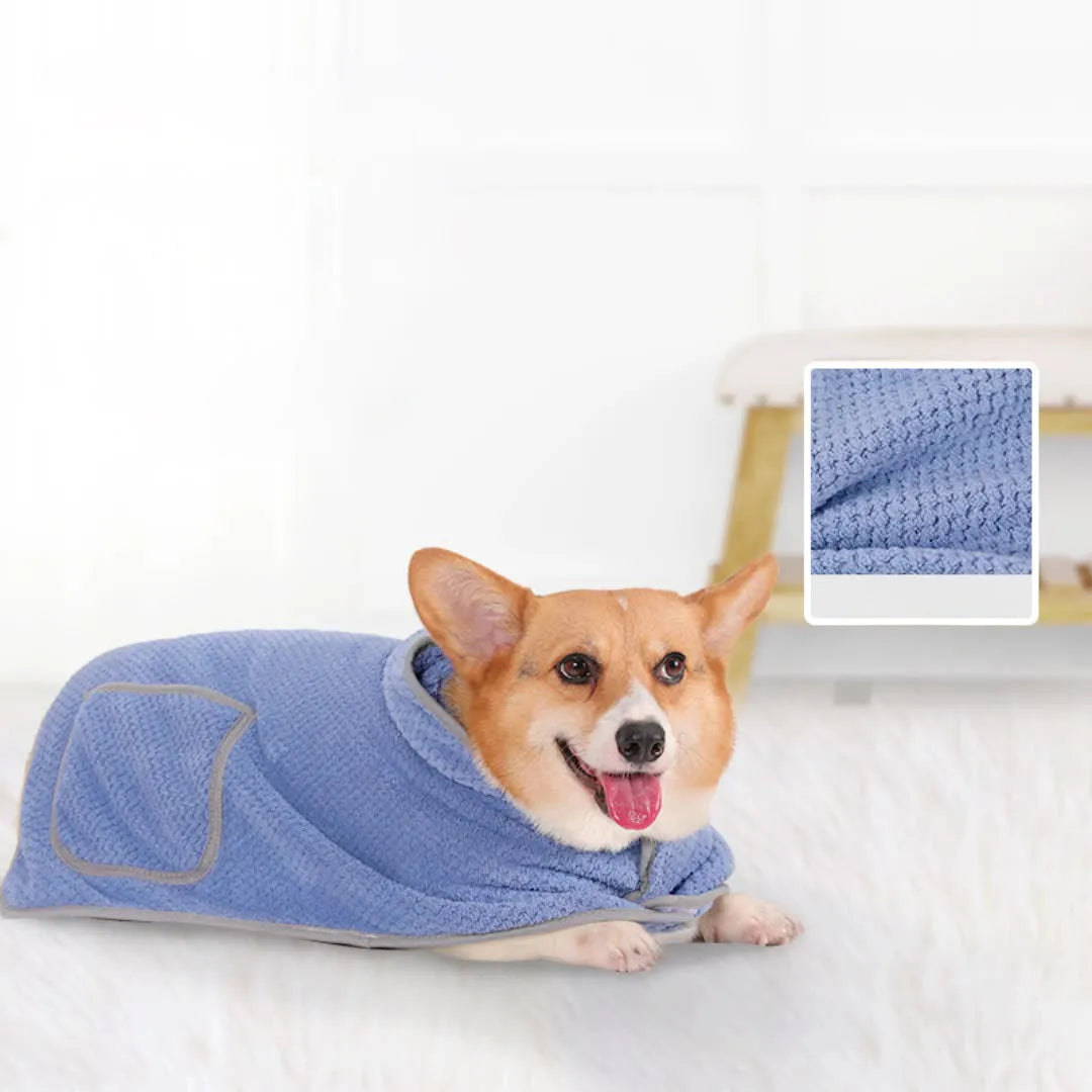 Blue quick drying dog bath robe towel with adjustable waistband placed on a fluffy mat